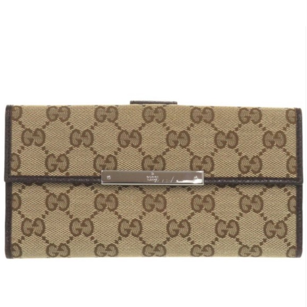 Gucci Brown Monogram Wallet with Flap Closure